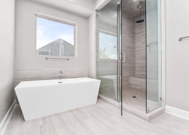 Master Bath with Stand-Alone Tub and Large mud set shower
